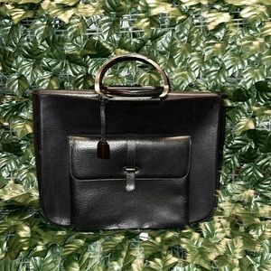 GUCCI. Black leather purse with date code front pocket for easy access